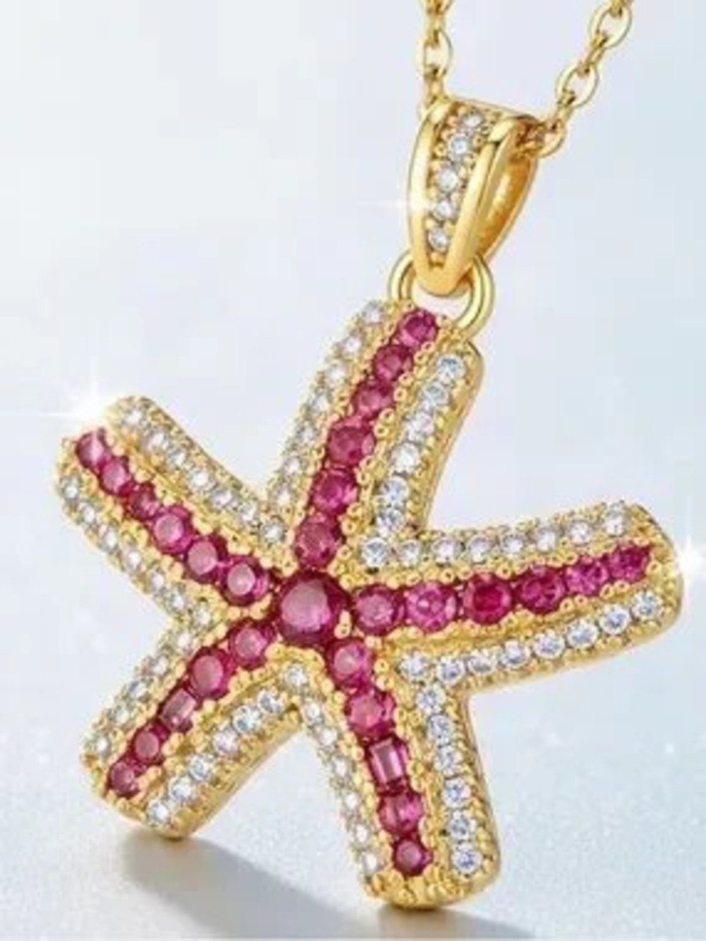 Anthropologie Gold Starfish Necklace with Pink and Clear Stones